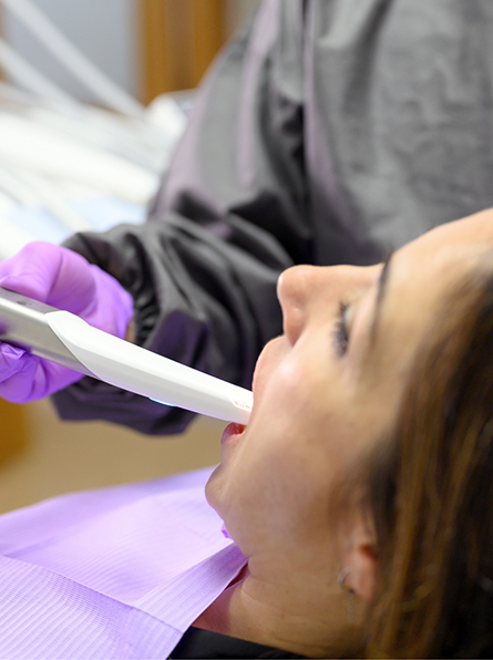 Female patient having digital impressions taken