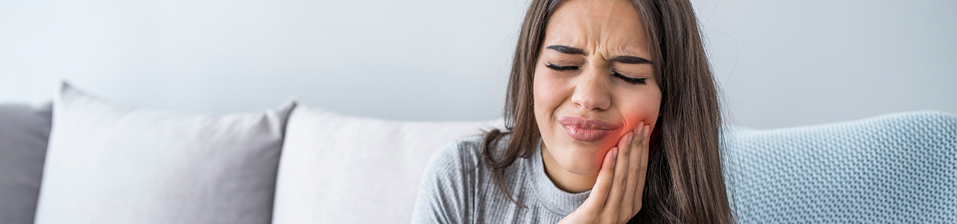 Close up of woman with toothache