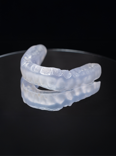 Close up of nightguard on reflective surface