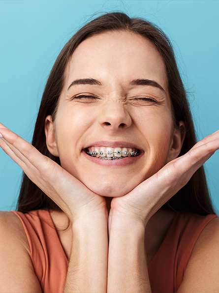 Close up of smiling woman with braces